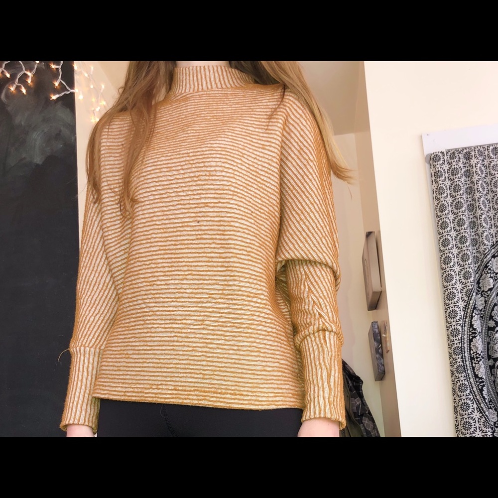Yellow and white stripped long sleeved